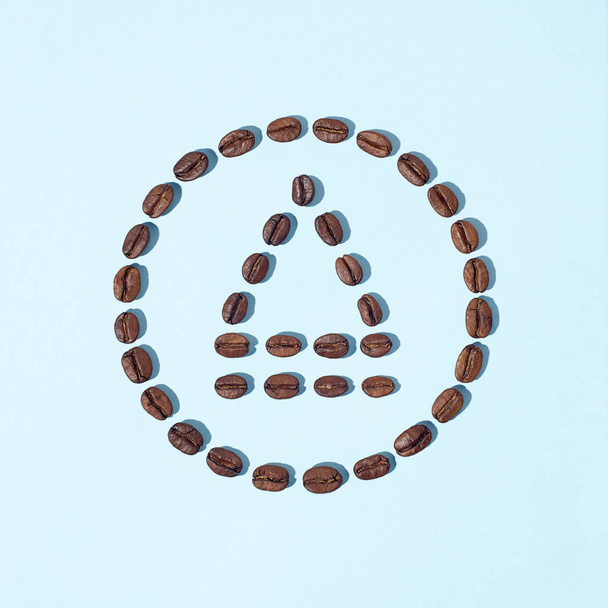 Eject symbol made from coffee beans - Foto, afbeelding