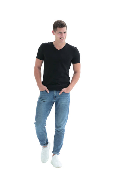 in full growth. casual guy in black t-shirt - Foto, afbeelding