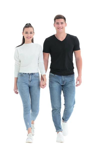 in full growth. casual young couple walking together - Фото, зображення