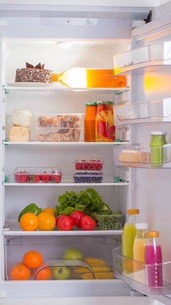 white refrigerator with different food - Φωτογραφία, εικόνα