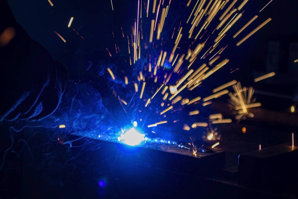.The process of welding metal in complete darkness. - Photo, Image