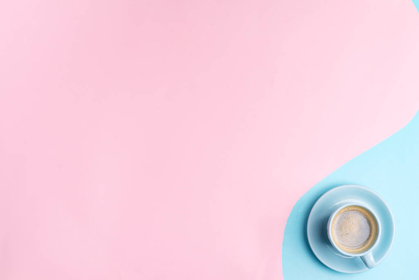 Creative pastel blue pink background with ceramic cup of freshly brewed coffee drink - Photo, Image