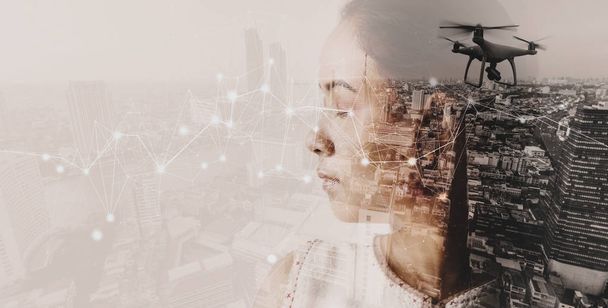 Double exposure of businesswoman and cityscape with Wireless network and Connection technology. - Photo, Image