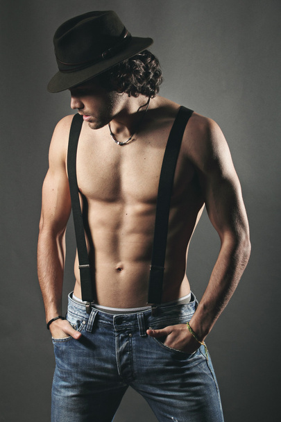 Studio shot of a sexy muscular man shirtless - Foto, Imagem