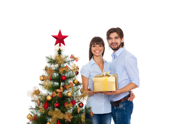 Christmas holiday happy couple, new year decorated tree - Фото, зображення