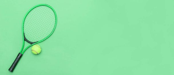 Top view of tennis racket and ball of green background. Horizontal sport poster, greeting cards, headers, website - Photo, Image