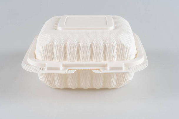 Disposable, square, plastic, white food container isolated on a white background. - Foto, Bild