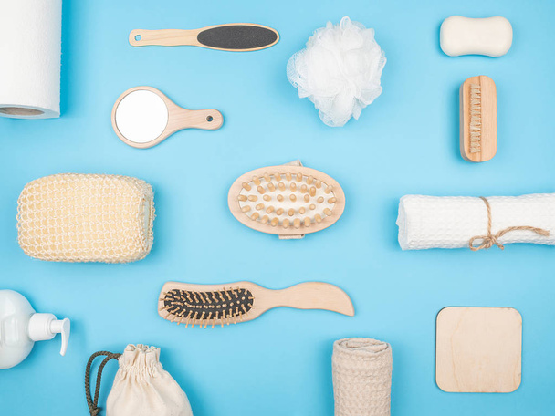 Accessories for the bathroom on a blue background. Bath accessories in the background. - 写真・画像