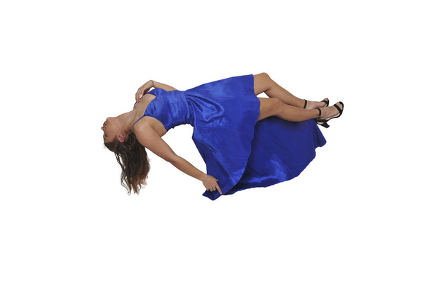 Gyönyörű fiatal nő lebeg a levegőben - Fotó, kép