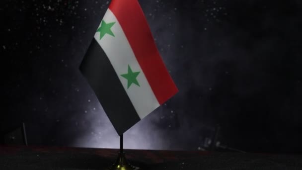 close-up footage of Syrian flag on dark background - Materiaali, video