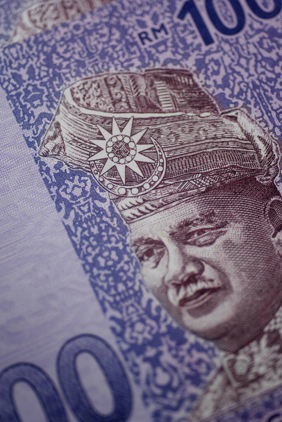 Malaysia currency of Malaysian ringgit banknotes background. Paper money of Hundred ringgit notes on etreme closeup. Financial concept. - Photo, Image