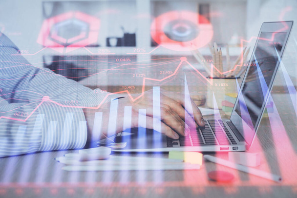 Double exposure of stock market graph with man working on laptop on background. Concept of financial analysis. - 写真・画像