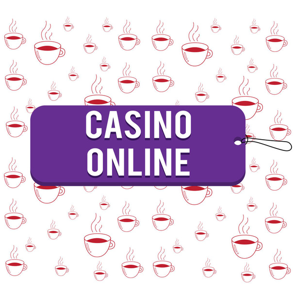 Nota de escrita mostrando Casino Online. Foto de negócios mostrando jogadores podem jogar e apostar em jogos de cassino através da etiqueta on-line emblema retângulo em forma de corda de espaço vazio fundo colorido
. - Foto, Imagem