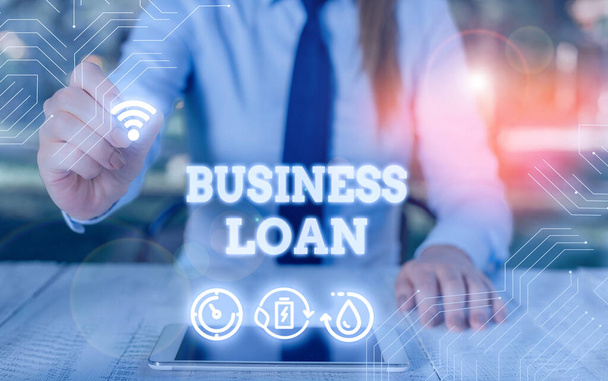 Egy üzleti hitelről szóló feljegyzés. Üzleti fotó bemutatása Kisvállalkozásoknak különböző célokra nyújtott hitelek. - Fotó, kép