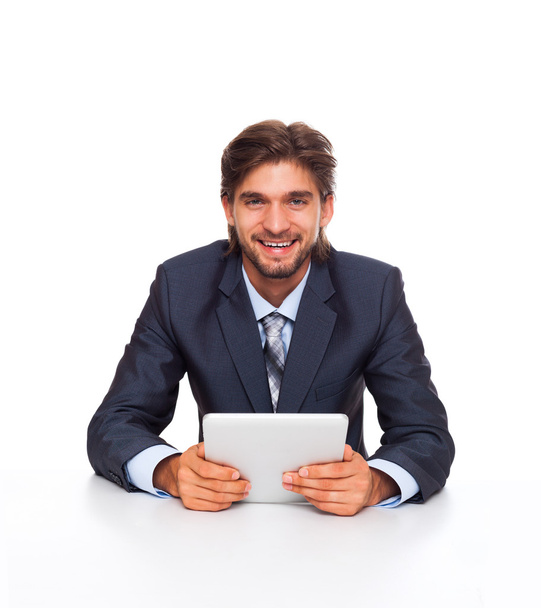 Businessman working using tablet pad - Fotó, kép