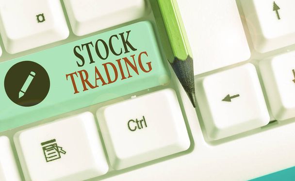 Writing note showing Stock Trading. Business photo showcasing the action or activity of buying and selling shares on market. - Fotó, kép