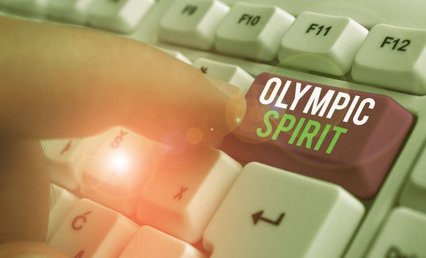 Conceptueel handschrift dat Olympic Spirit toont. Zakelijke foto tekst met trots in uw nationale team, maar afgezien van de politiek. - Foto, afbeelding