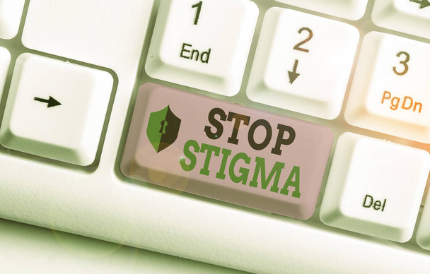 Signo de texto que muestra Stop Stigma. Foto conceptual termina el sentimiento de desaprobación que la mayoría de los que muestran en la sociedad tienen
. - Foto, imagen