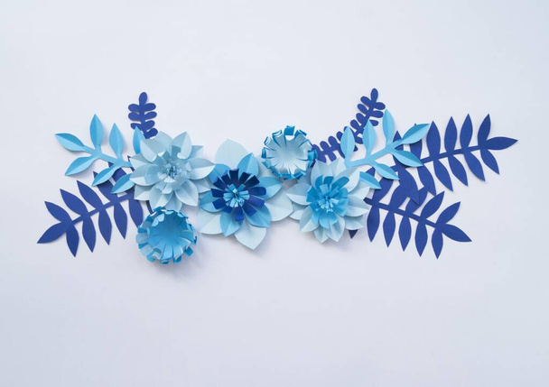 Flower made of paper. Blue and white color. Creativity is a hobby. - Foto, afbeelding