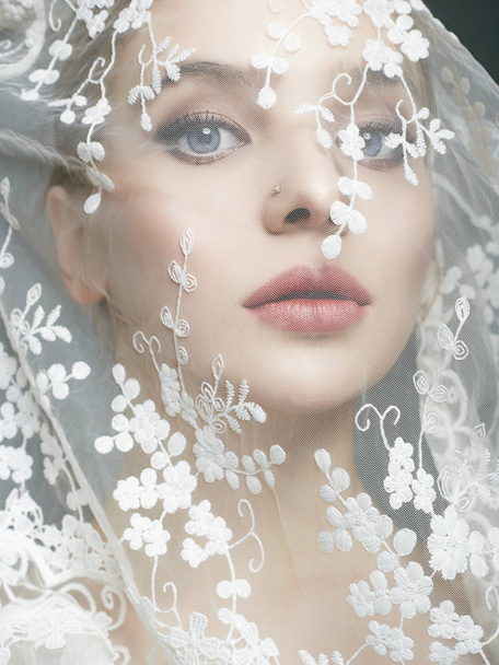bride under a veil. Sensual beautiful young Woman. beautiful female lovely Face - Photo, Image