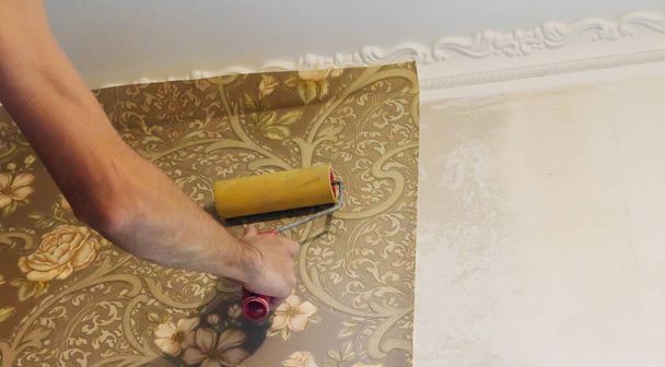 Wallpapering repair work. Selective focus. - Photo, Image