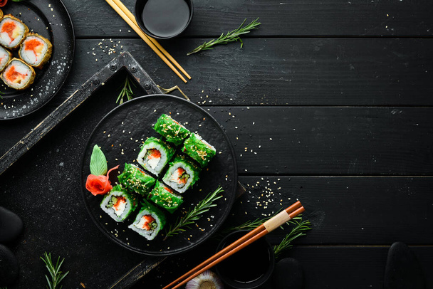 Green sushi. Japanese sushi with Chuka salad. Asian Diet Food. Top view. - Valokuva, kuva