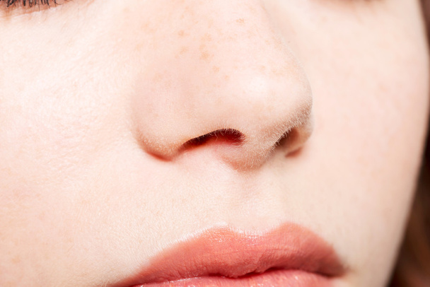 Close up of a female's face- nose and mouth. - Valokuva, kuva