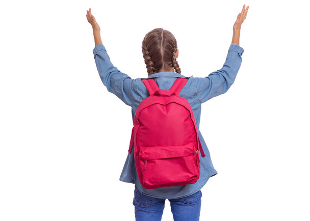 Student teen girl with backpack - back view. Portrait of cute schoolgirl with raised up arms, isolated on white background. Happy child Back to school - rear view. - Photo, image