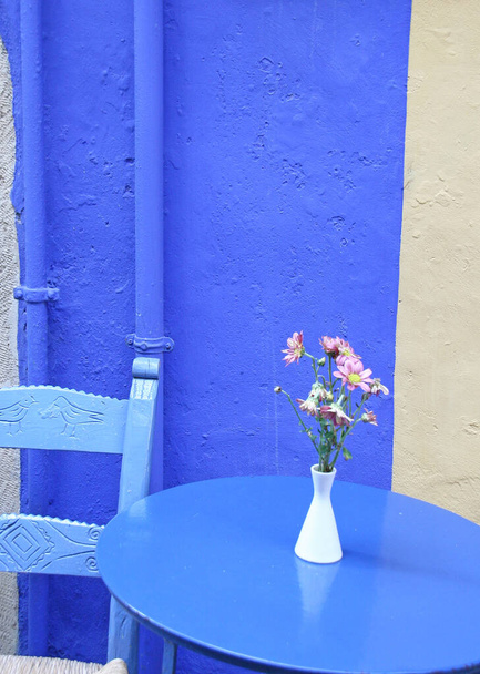 blue old chairs  and table in caffe in Chania, Crete, Greece - Φωτογραφία, εικόνα