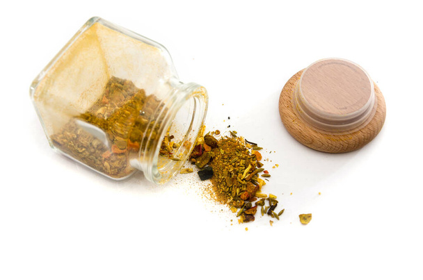Oriental spices in containers on a white background. Spice mix for pilaf. - Photo, Image