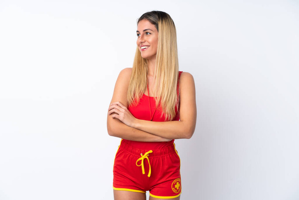 Lifeguard woman over isolated white background laughing - Photo, Image