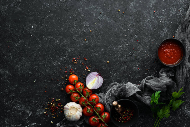 Black banner. Background of cooking, spices and vegetables. Top view. Free space for your text. - Φωτογραφία, εικόνα