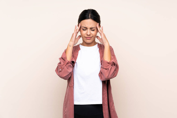 Woman over isolated background with headache - Fotó, kép