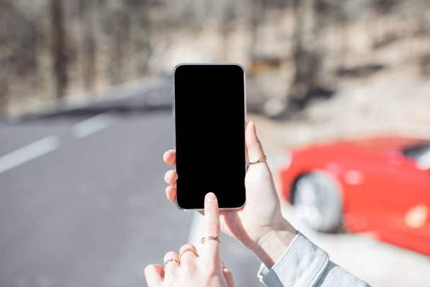 Smartphone mockup on the mountain road - 写真・画像