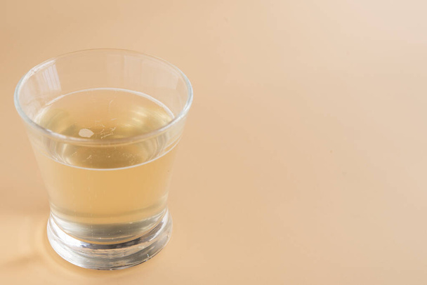 Kombucha of ginger and lemon in glass - Фото, изображение