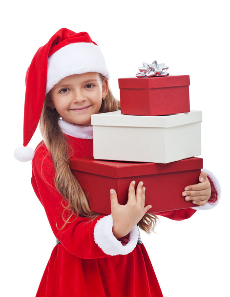 Girl in christmas outfit holding presents - Fotoğraf, Görsel