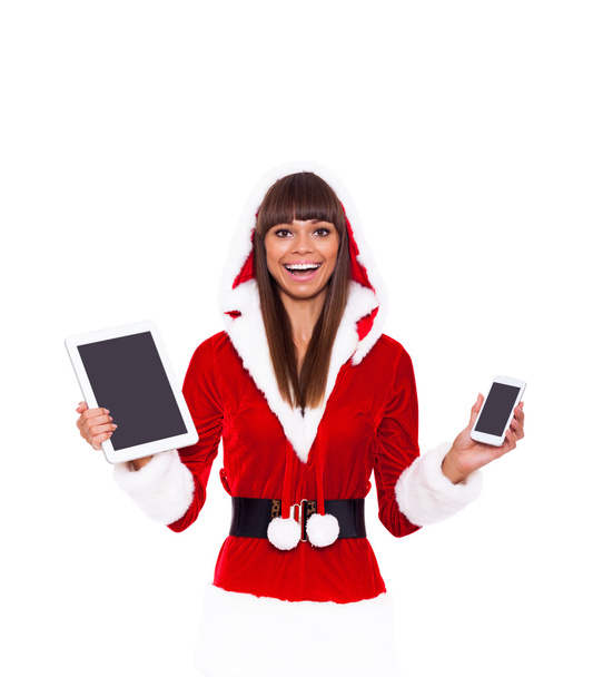Christmas girl happy smile hold tablet pad computer present - Foto, afbeelding