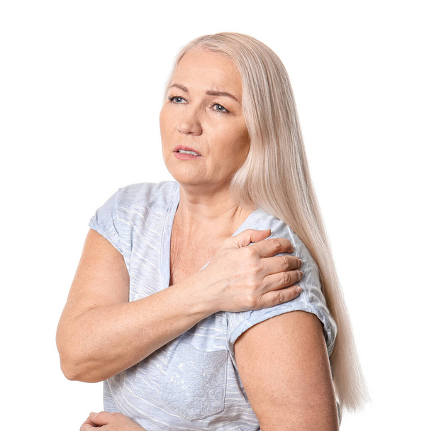 Senior woman suffering from Parkinson syndrome on white background - Fotoğraf, Görsel