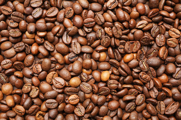Muchos granos de café como fondo
 - Foto, imagen