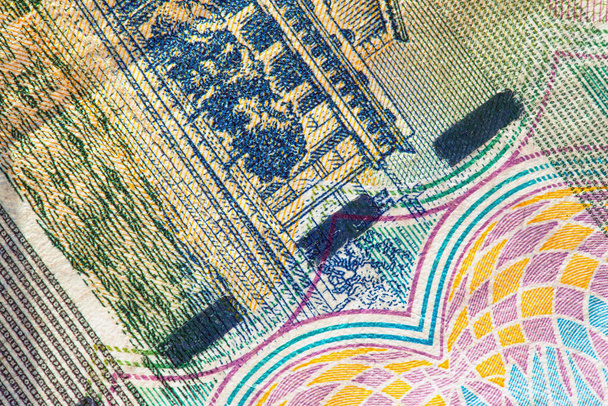 pedazo de billete de dinero con cinta protectora, fondo
 - Foto, imagen