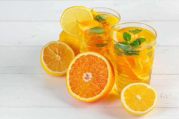 Citrus lemonade, summer drink. close up. creative photo. - Фото, изображение