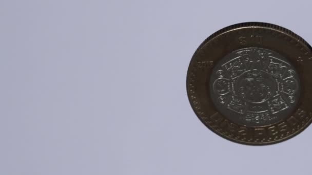 !0 Pesos mexikanische Münze auf weißem Hintergrund - Filmmaterial, Video
