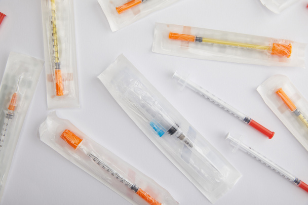 Top view of syringes on white background - Photo, Image