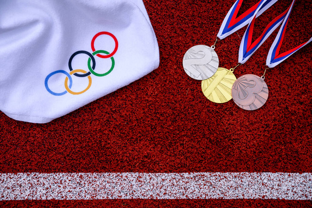 TOKYO, JAPAN, MARCH 5. 2020: Olympic medal ceremony, concept photo, Red edit space - 写真・画像