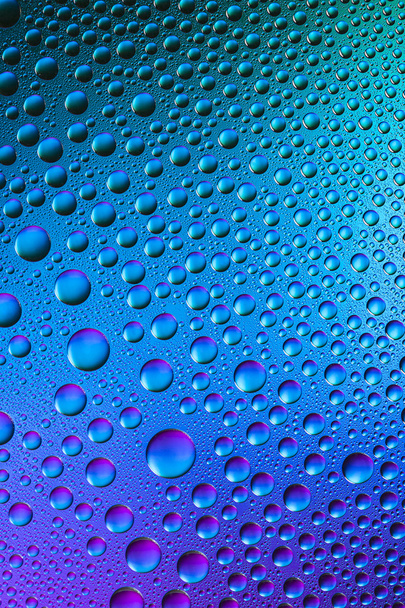 Water drops spectral gradient blue ocean purple colors rainbow colorful beading lotuseffekt tau sealing - Photo, Image