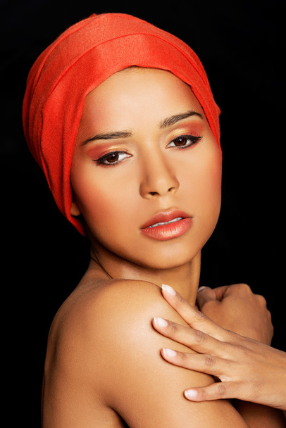 Attractive woman's face in turban. Closeup. - Foto, Imagem