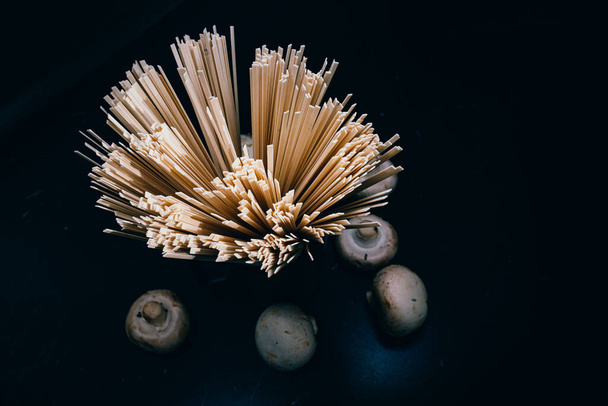  mushrooms and pasta in table - Photo, Image