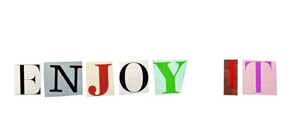 Enjoy It word formed with magazine letters on a white background - Photo, Image
