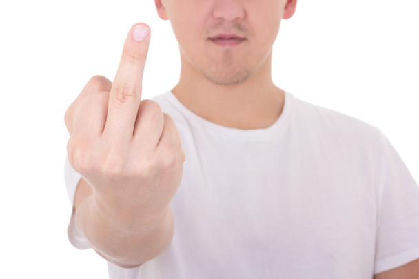 close up of young man showing middle finger isolated on white - Photo, Image