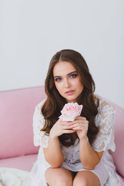 Close-up portrait of young beautiful model with rose - Fotografie, Obrázek